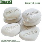 Engraved pebble stone with words decorative stone