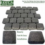 Light, dark gray granite interlocking paving stone